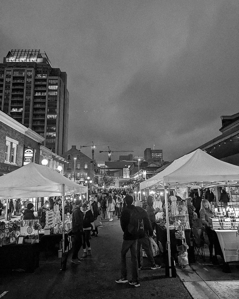 ByWard Night Market at dusk, vendor tents lit along a Market street